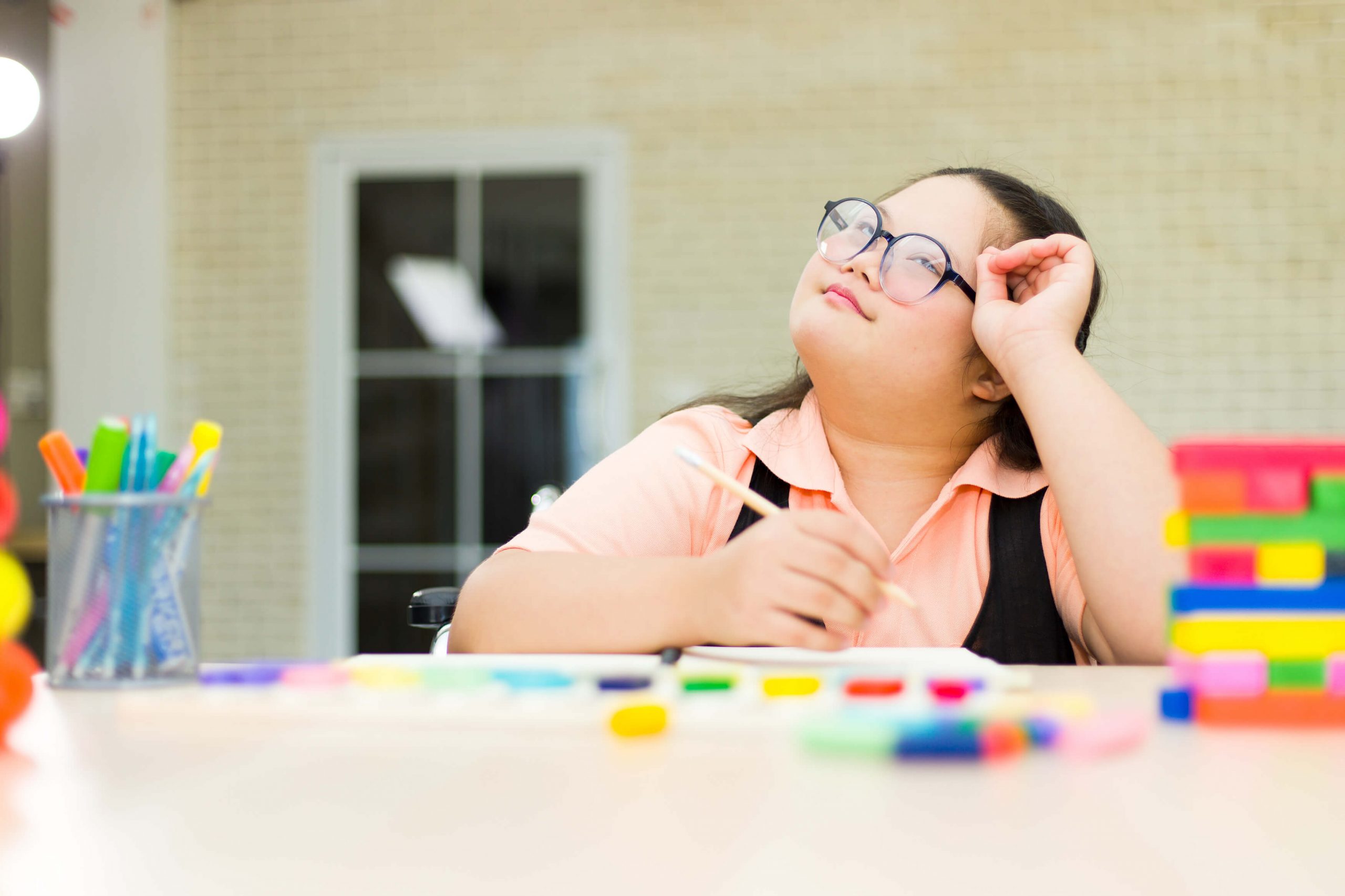 girl learning at home