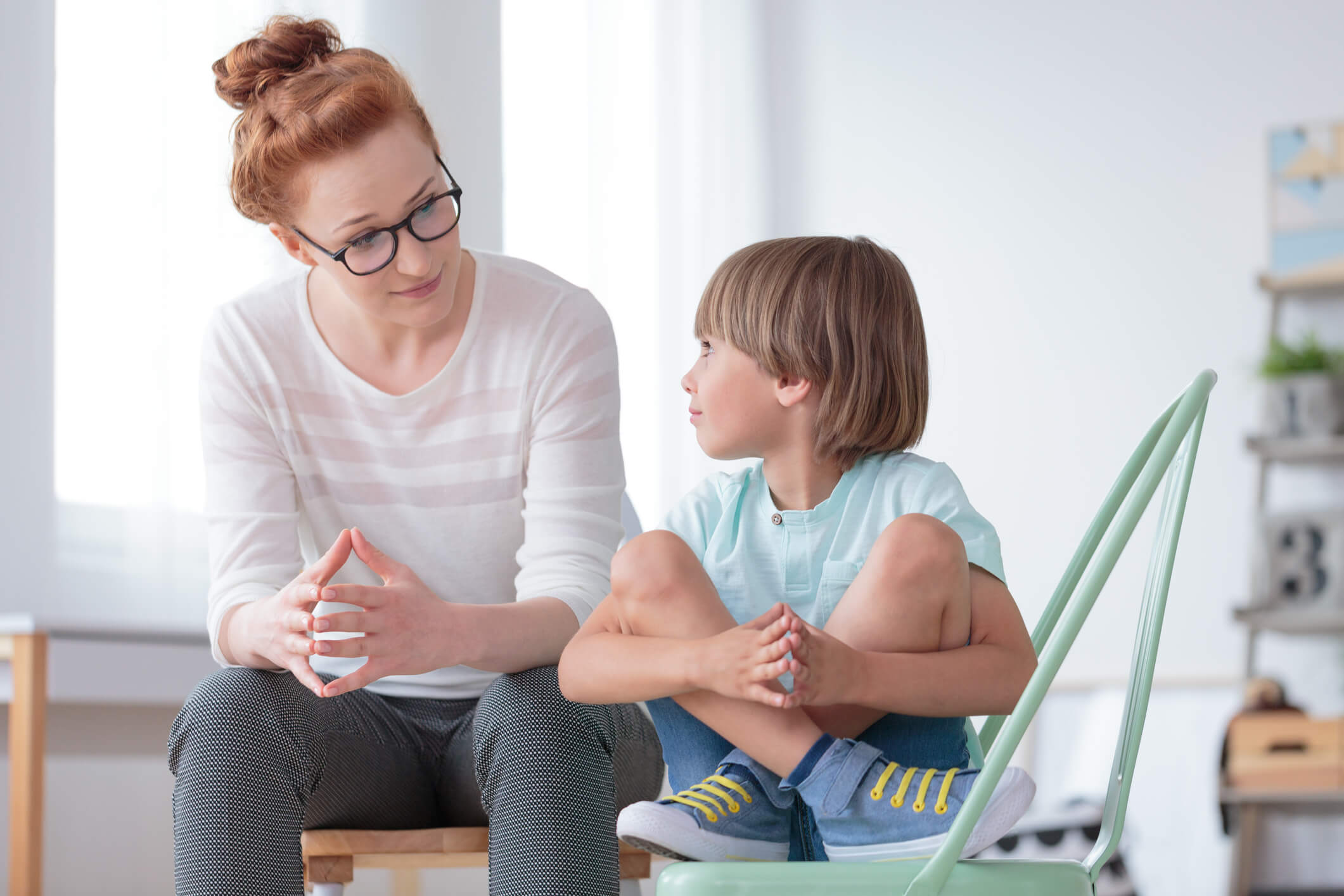 counselor talking with boy